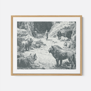 Daniel In The Lions Den - Framed Glass Print